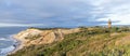 Gay Head Lighthouse and Gay Head cliffs of clay at the westernmost point of Martha`s Vineyard in Aquinnah Royalty Free Stock Photo