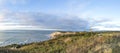 Gay Head Lighthouse and Gay Head cliffs of clay at the westernmost point of Martha`s Vineyard in Aquinnah Royalty Free Stock Photo