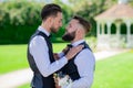 Gay man groom at wedding. Same-sex marriage and love concept. Happy gay couple on wedding. Romantic and sensual gay Royalty Free Stock Photo
