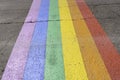 Gay pride flag crosswalk on the road of a city Royalty Free Stock Photo