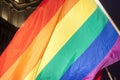 Gay Pride Flag, sunlit against the black sky Royalty Free Stock Photo