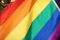 Gay Pride Flag, sunlit against the black sky Royalty Free Stock Photo