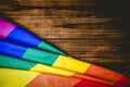 Gay pride flag on wooden table Royalty Free Stock Photo