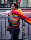 Gay Pride Parade in San Francisco - woman wears rainbow shirt an