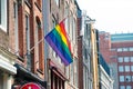 Gay Pride Rainbow Flag in a Street in historical city center of Amsterdam.