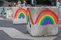 Gay pride rainbows painted on anti-terrorism concrete blocks Royalty Free Stock Photo