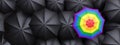 Gay pride, standout. Rainbow color umbrella among black, top view. LGBRQ difference. 3d render
