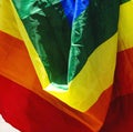 Gay rainbow flag on Pride Parade, close up. Royalty Free Stock Photo