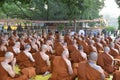 Several unidentified Buddhist monks pray at at Mahabodhi Stupa Bodh Gaya
