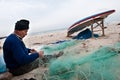 Gaza Fisherman Mending Nets