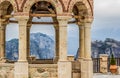 Gazebo antique European architecture building object with stone columns and dome in highland mountain gray cloudy and foggy Royalty Free Stock Photo