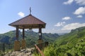 Gazebo with a bell near the ancient Ossetian Christian church in the mountains of the Caucasus