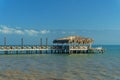 Gazebo with a bridge in the sea, vacation concept Royalty Free Stock Photo