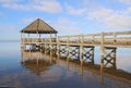 Gazebo, dock, blue sky and clouds