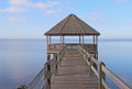 Gazebo and dock over calm sound waters Royalty Free Stock Photo