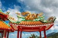 gazebo with a golden dragon on the roof of Chinese Sangthom Temple of the Goddess of Mercy Shrine in Chaloklum, Ko Pha Ngan, Thail