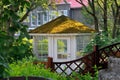 Gazebo with green roof covered with moss. Royalty Free Stock Photo