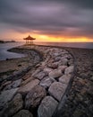 Gazebo at Karang beach, Sanur, Bali, Indonesia on background of a fiery sunsey Royalty Free Stock Photo