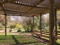 gazebo with lattice roof for relaxing in decorative farm Botanical Garden Emek Hefer