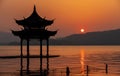 Gazebo near lake at sunset Royalty Free Stock Photo