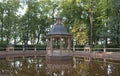 Gazebo and pond in Summer garden Royalty Free Stock Photo