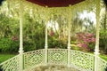 Gazebo in southern garden showing an Azalea garden surrounding it.