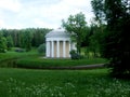 Gazebo surrounded by a lake in the middle of the forest Royalty Free Stock Photo