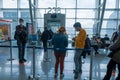 Gaziemir, Izmir, Turkey - 03.11.2021: people with mask waiting in front of flight gate in Aydin Menderes Airport in quarantine