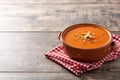 Gazpacho soup in crockpot on wooden table. Typical Spanish food