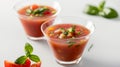 Gazpacho soup in glasses garnished with herbs and vegetables Royalty Free Stock Photo