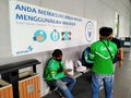 GCO, Pluit, Jakarta, Indonesia - (04-23-2021) : Food delivery workers waiting in the office area