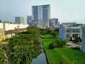 GCO, Pluit, JakaResidential residents beside the river