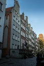 Old Piwna Street with lots of historic, colorful tenement houses in Gdansk, Poland