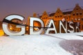 Gdansk city outdoor sign at snowy winter, Poland