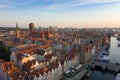 Gdansk is a city in Poland. Gdansk in the morning rays, the sun is reflected from the roofs of the old city. Royalty Free Stock Photo