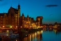 Gdansk cityscape with medieval port, Zuraw crane and Motlawa river at night, Poland Royalty Free Stock Photo