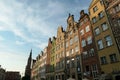 Gdansk - A close up of the facades of tall building in the middle of Old Town in Poland. The buildings have many bright colors