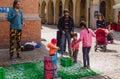 Children blowing bubbles at a vendor