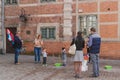 Children blowing bubbles at a vendor Royalty Free Stock Photo