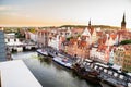 Gdansk, North Poland : Panoramic aerial shot of Motlawa river embankment in Old Town during sunset in summer Royalty Free Stock Photo