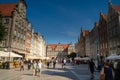 Gdansk, North Poland - August 13, 2020: Tourists walking next to neptune`s fountain touristic spot in main square city center