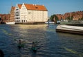 Gdansk, North Poland : Wide angle shot of Summer and people kayaking in motlawa river adjacent to beautiful
