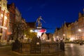 Gdansk - October 31, 2020: Fountain of the Neptune at the Long Lane in Gdansk old town by night, Poland Royalty Free Stock Photo