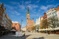 Gdansk, Poland, April 17, 2018: City Hall with spire, clock tower and Facade of beautiful typical colorful houses