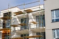 Construction scaffolding of a modern apartment building under construction