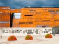 GDANSK, POLAND - AUGUST 25, 2014: European Solidarity Centre in Gdansk, Poland. Modern museum building with rusty layout Royalty Free Stock Photo