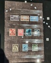 GDANSK, POLAND: Old postal stamps from different European countries during world war II time on the wall