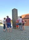 GDANSK, POLAND. Tourists view stela with celebrity palm prints. Avenue of stars