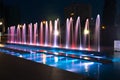 Water fountain at European Solidarity Centre at night. Royalty Free Stock Photo