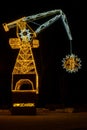 Gdansk Poland - December 2022 Construction crane symbol of Shipyard Holiday illuminated decorations. Beautiful Christmas